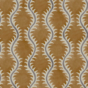 A printed linen fabric sample in orange, blue and off white featuring a stylized fern pattern.