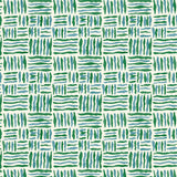 A printed linen fabric sample in blue, green and off white featuring a basketweave pattern.