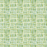 A printed linen fabric sample in green, blue and off white featuring a basketweave pattern.