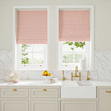 Blinds made from a printed linen fabric sample in pink, red and off white featuring a sound wave pattern