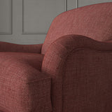 Red chair upholstered in a chenille woven fabric.