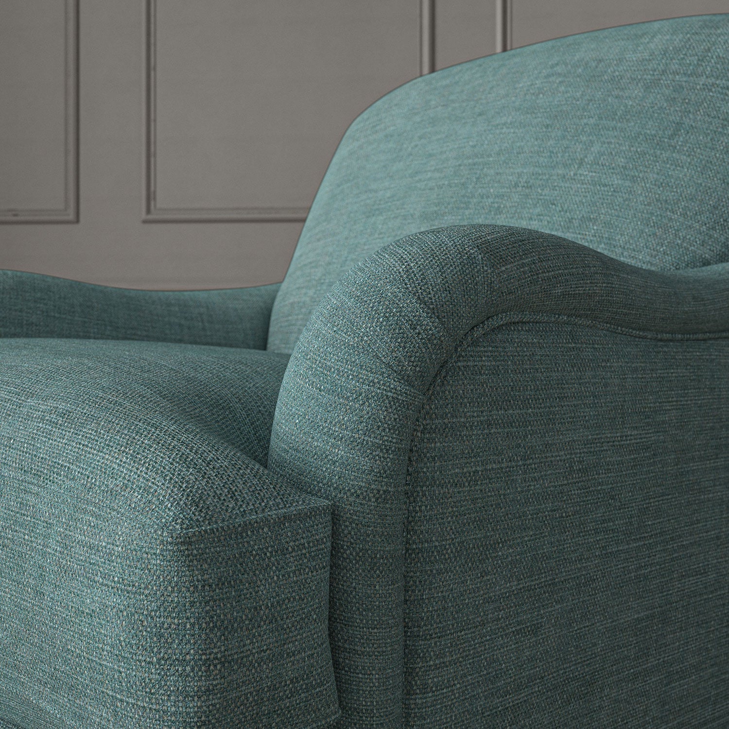 Blue chair upholstered in a chenille woven fabric.