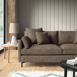 Brown sofa upholstered in a chenille woven fabric.