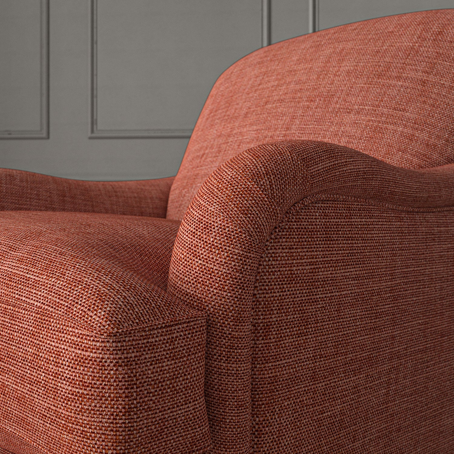 Red chair upholstered in a chenille woven fabric.