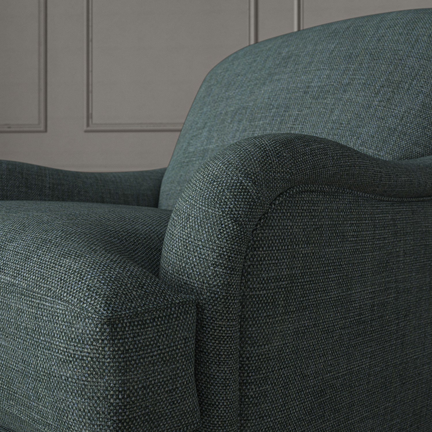 Blue chair upholstered in a chenille woven fabric.