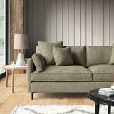 Brown sofa upholstered in a chenille woven fabric.