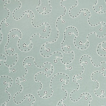White embroidery pattern on a light blue background.