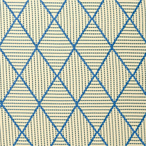 Geometric embroidery pattern with blue and beige lines on a textured background