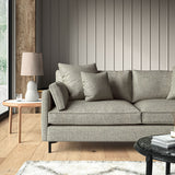 Woven light grey coloured fabric on a sofa