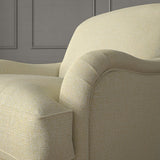 Woven cream coloured fabric on a chair