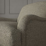 Woven grey coloured fabric on a chair