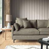 Woven grey coloured fabric on a sofa