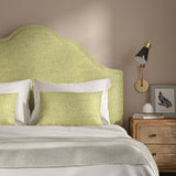 Woven Lime coloured fabric on a headboard