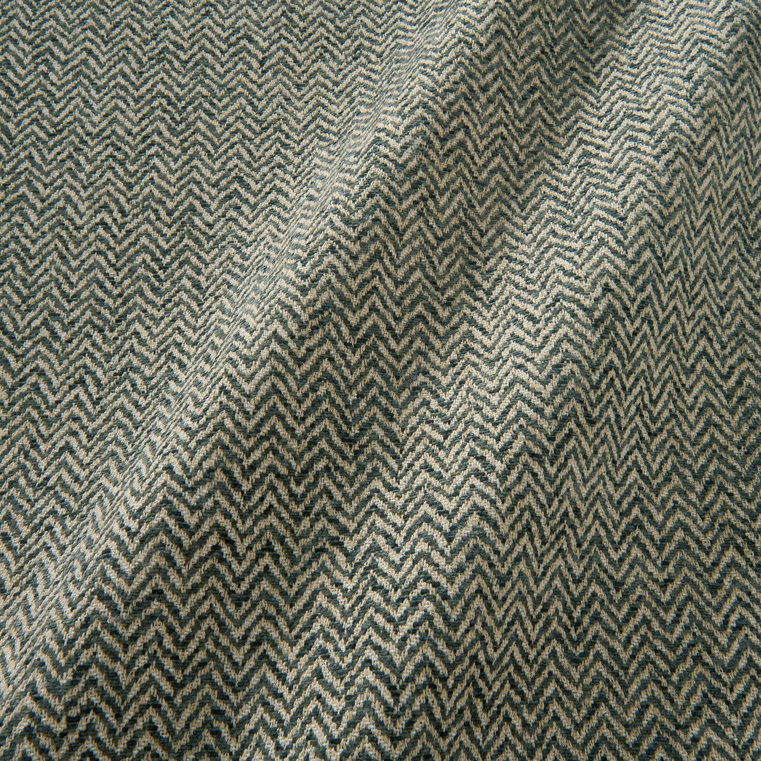 A woven fabric sample in grey and off-white featuring a herringbone pattern.