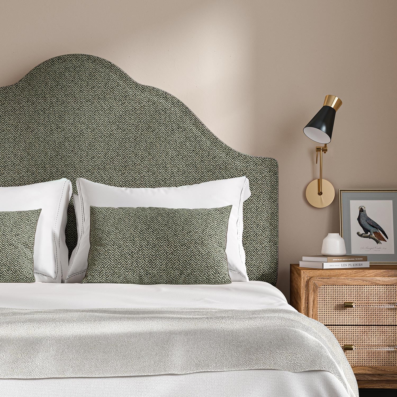 Headboard upholstered in a grey and off-white woven fabric featuring a herringbone pattern.