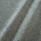 A woven fabric sample in blue and off-white featuring a herringbone pattern.