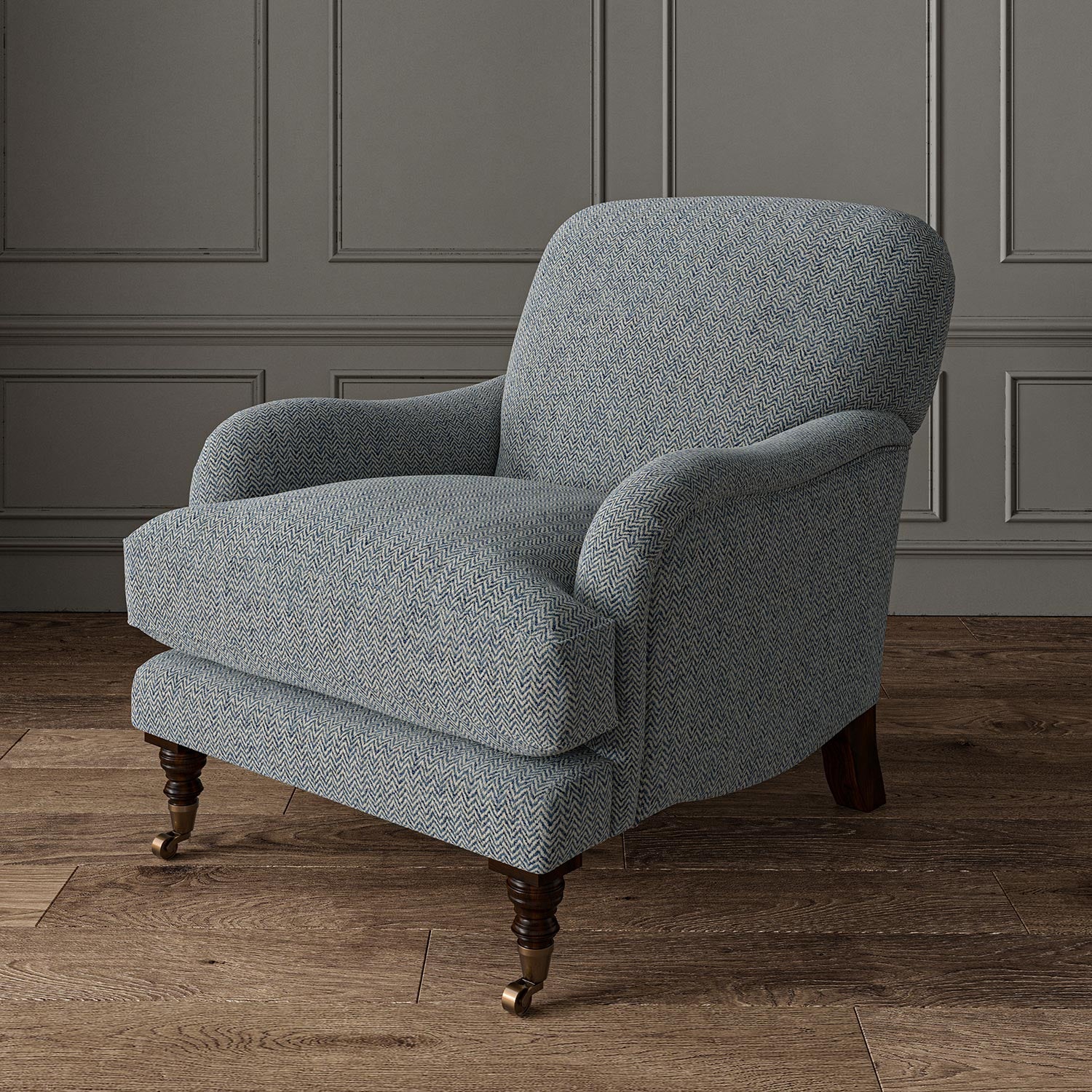Chair upholstered in a blue and off-white woven fabric featuring a herringbone pattern.