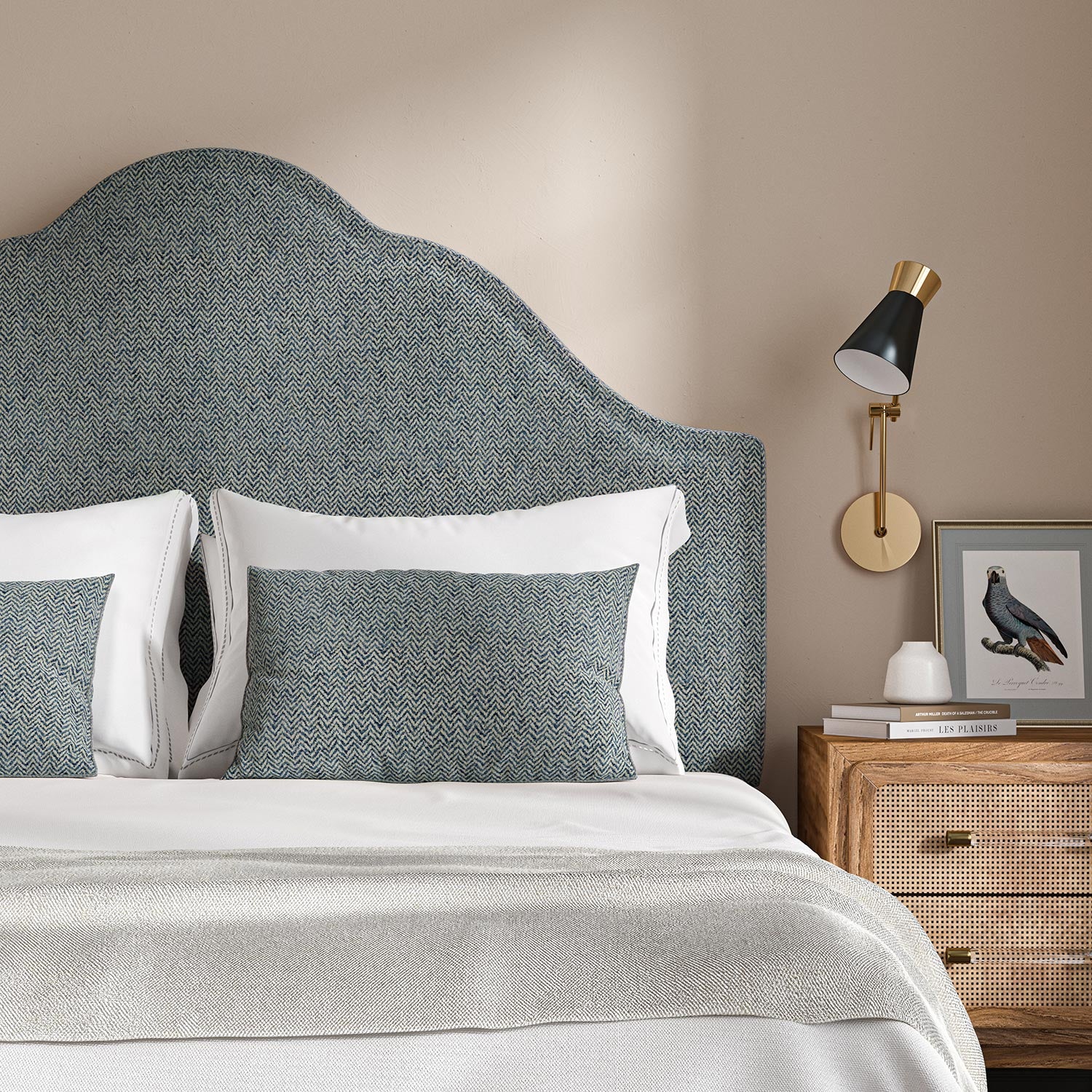 Headboard upholstered in a blue and off-white woven fabric featuring a herringbone pattern.