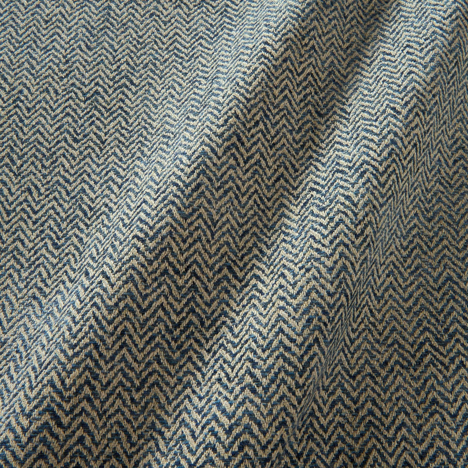 A woven fabric sample in blue and off-white featuring a herringbone pattern.