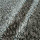 A woven fabric sample in blue and off-white featuring a herringbone pattern.