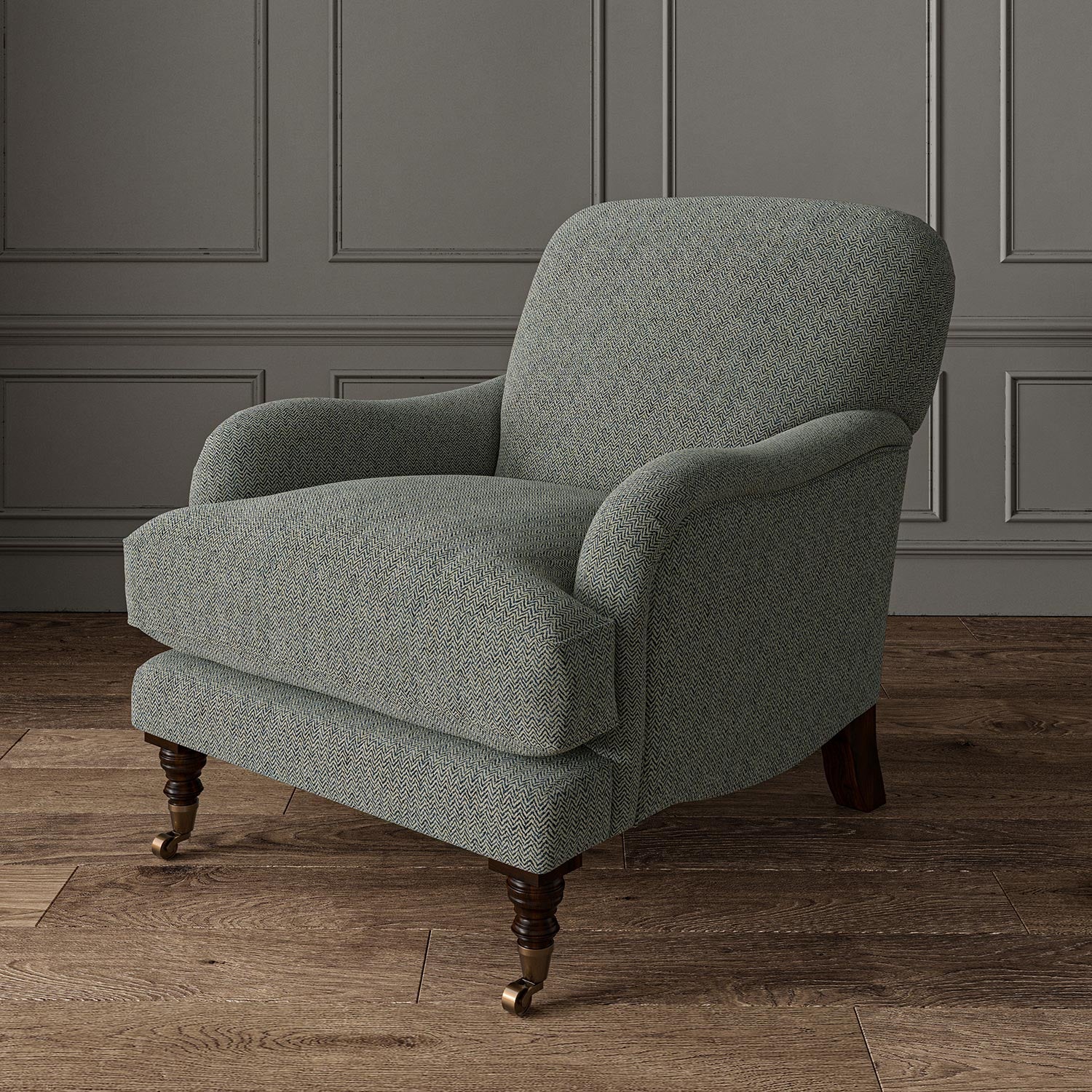 Chair upholstered in a blue and off-white woven fabric featuring a herringbone pattern.