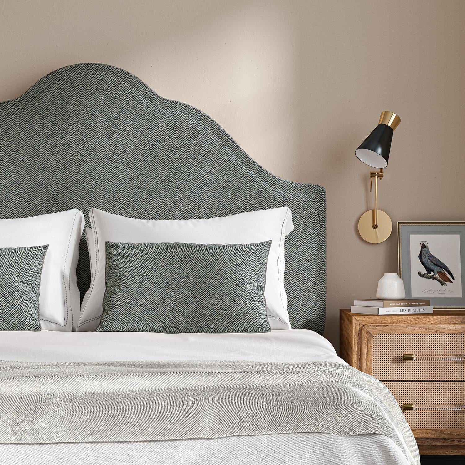 Headboard upholstered in a blue and off-white woven fabric featuring a herringbone pattern.