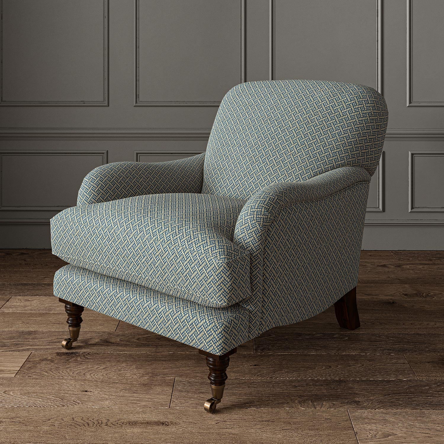 Chair upholstered in a blue and off-white woven fabric featuring a trellis pattern.