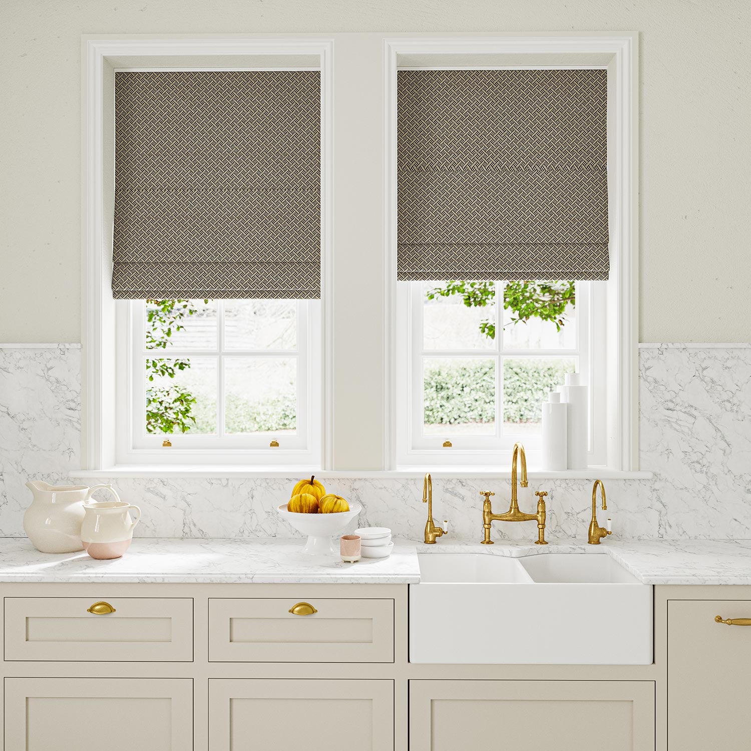 Blinds in blue and off-white woven fabric featuring a trellis pattern.