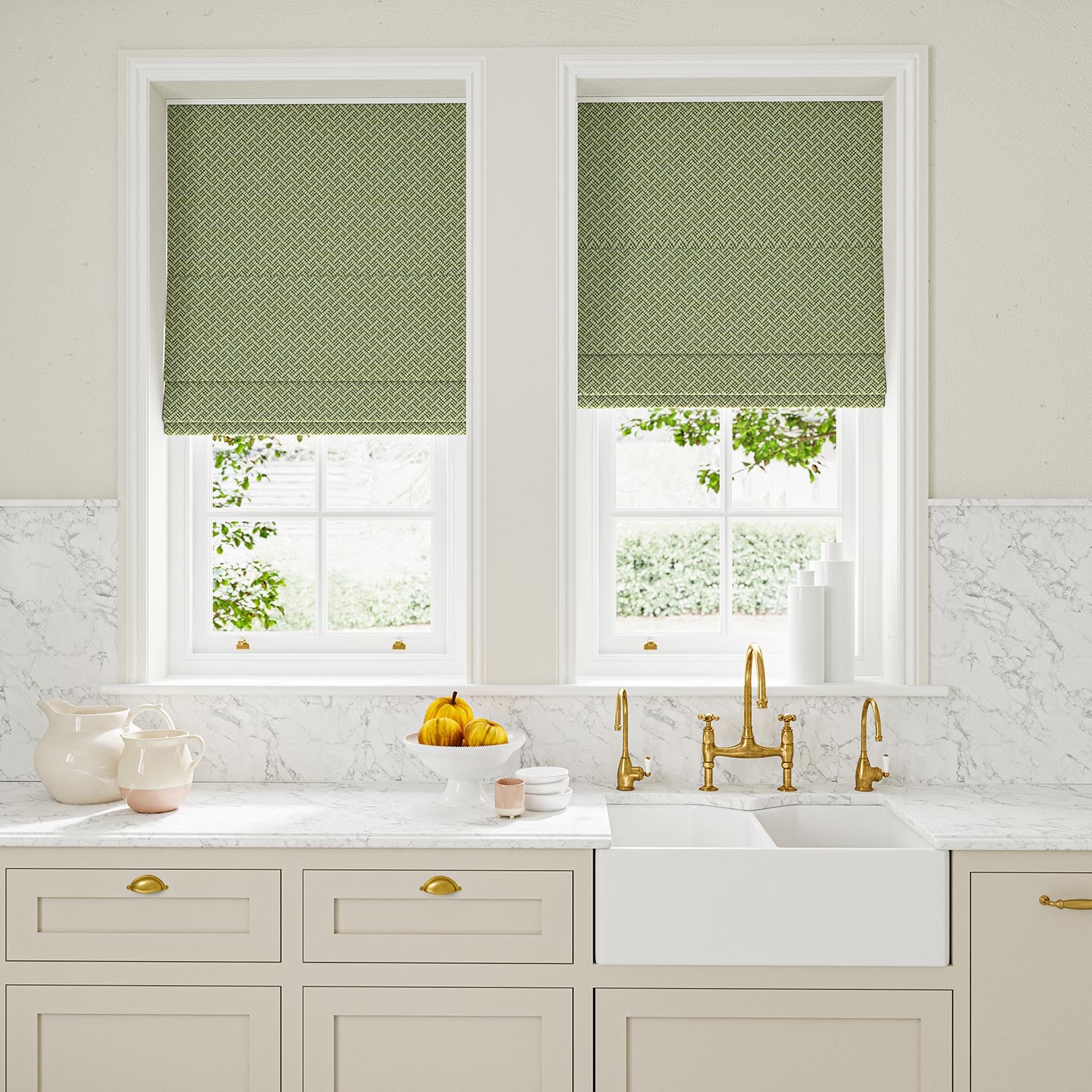 Blinds in green and off-white woven fabric featuring a trellis pattern.