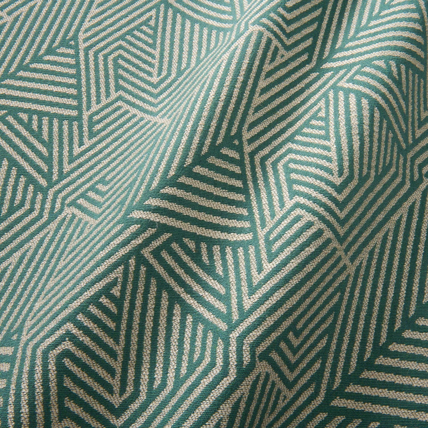 A woven fabric sample in blue and off-white featuring a geometric pattern.