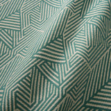 A woven fabric sample in blue and off-white featuring a geometric pattern.