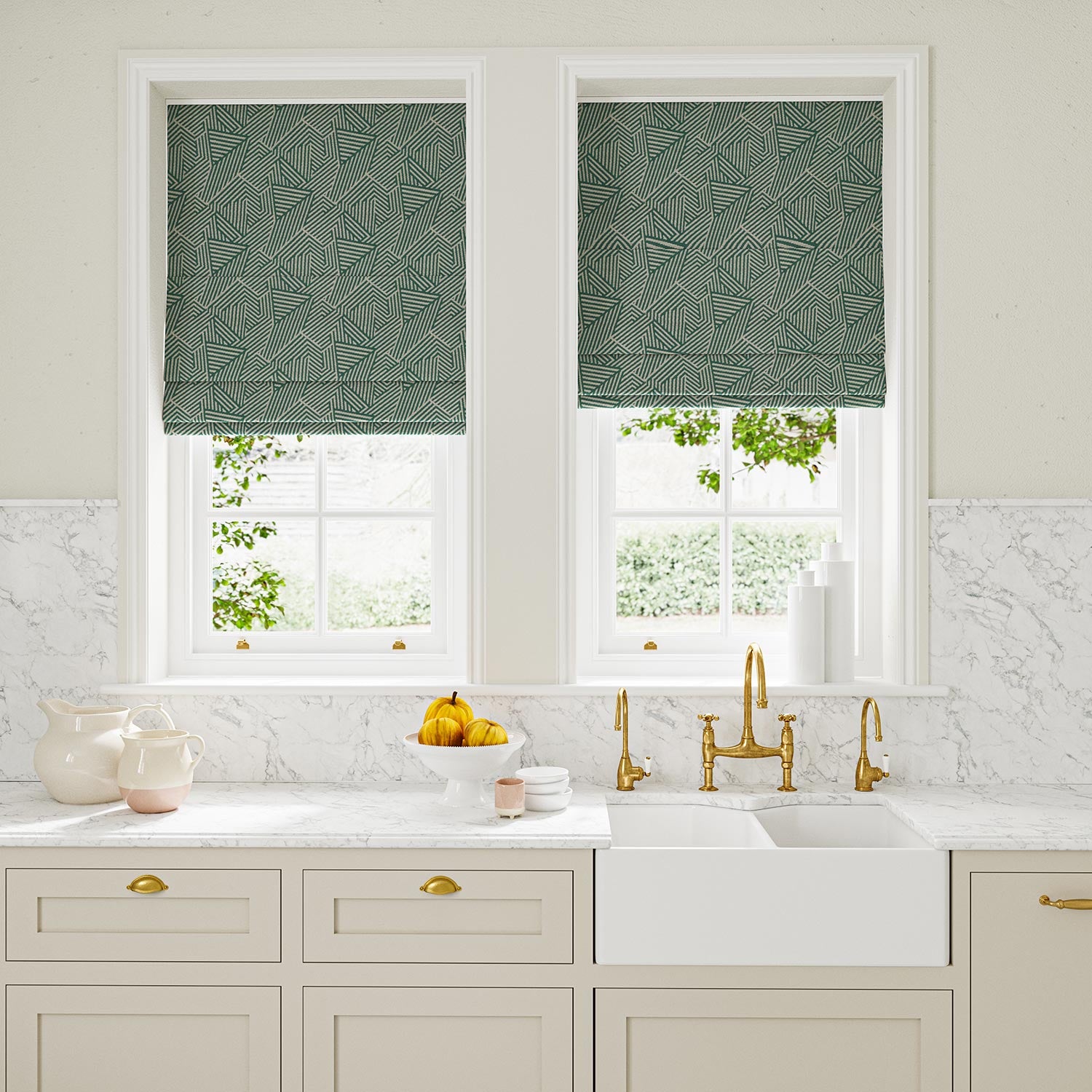 Blinds in blue and off-white woven fabric featuring a geometric pattern.
