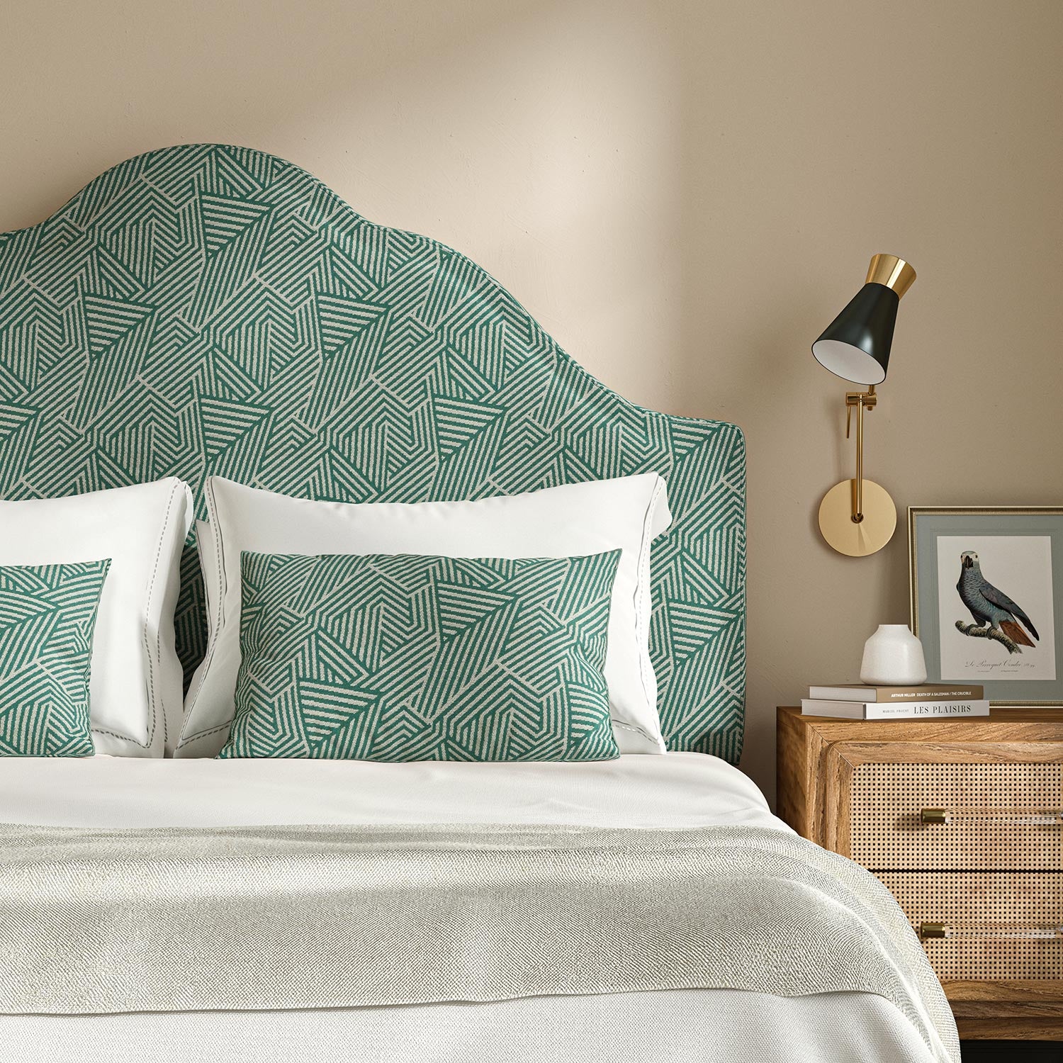 Headboard upholstered in a blue and off-white woven fabric featuring a geometric pattern.