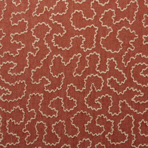 A woven fabric sample in red and off-white featuring a wavy pattern.