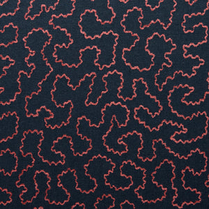 A woven fabric sample in blue and red featuring a wavy pattern.