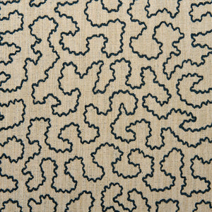 A woven fabric sample in black and beige featuring a wavy pattern.