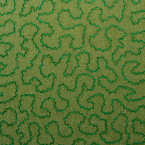 A woven fabric sample in green featuring a wavy pattern.