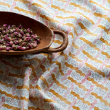 Printed linen fabric - a contemporary lattice design in yellow, pink, cream and white 