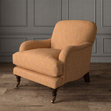 Orange chair upholstered in a versatile woven fabric.