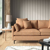 Orange sofa upholstered in a versatile woven fabric.