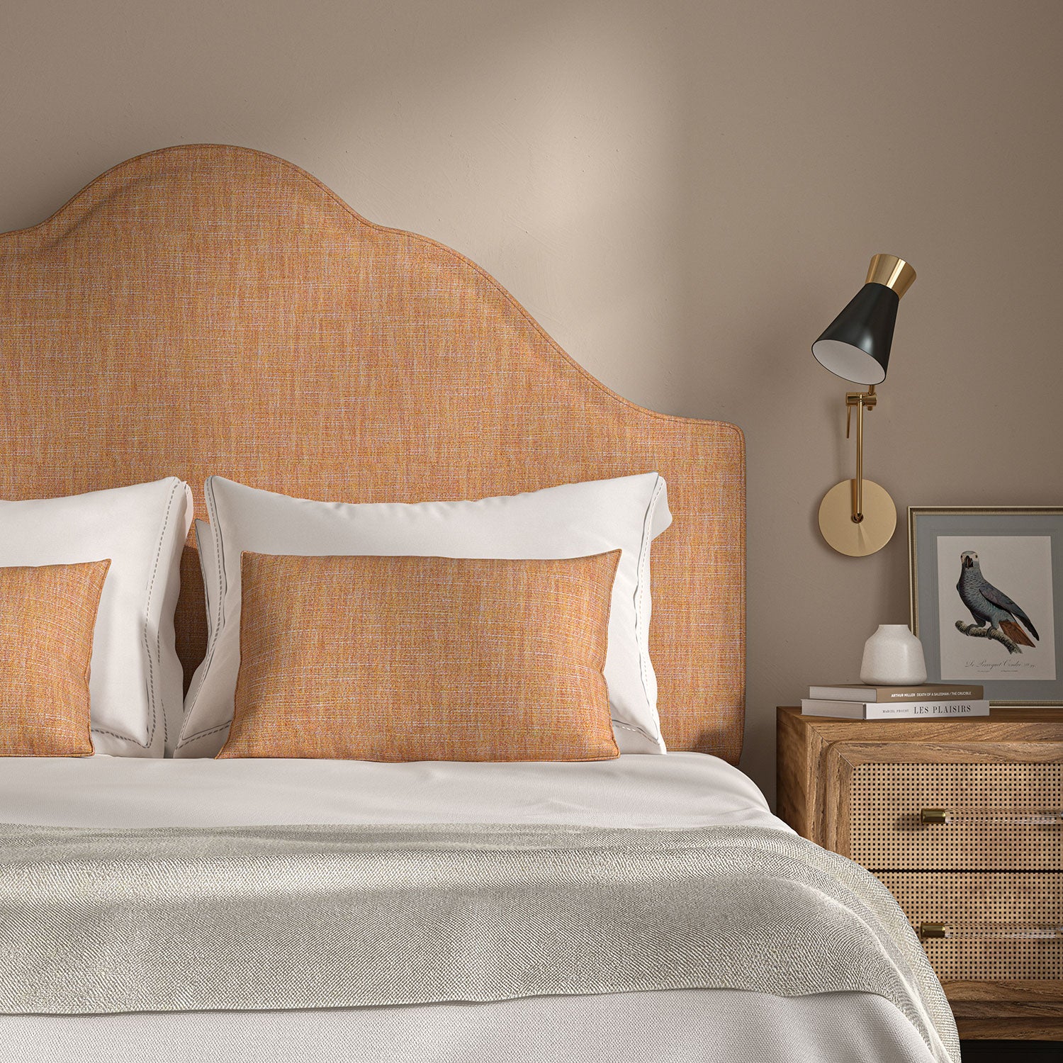 Orange headboard upholstered in a versatile woven fabric.