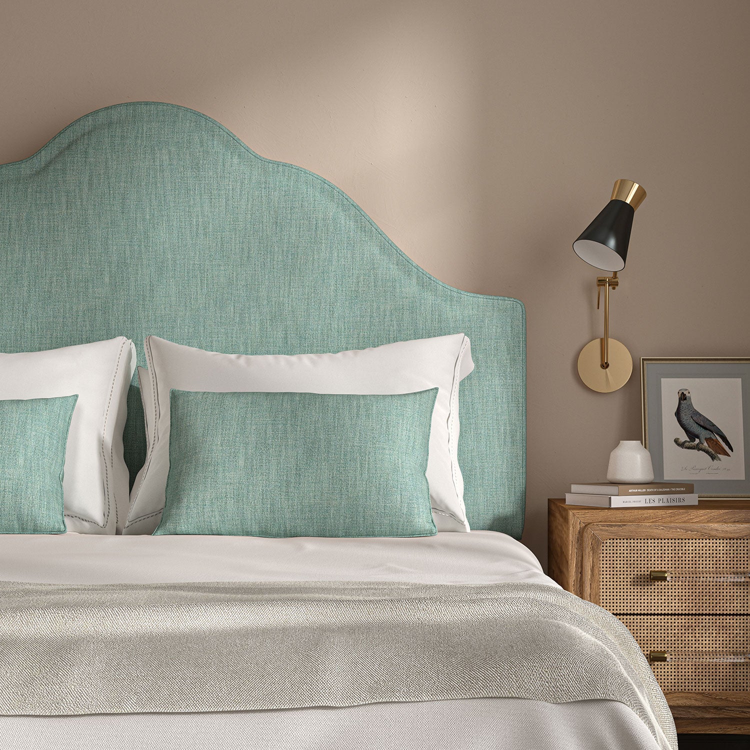 Blue headboard upholstered in a versatile woven fabric.