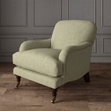 Beige chair upholstered in a versatile woven fabric.