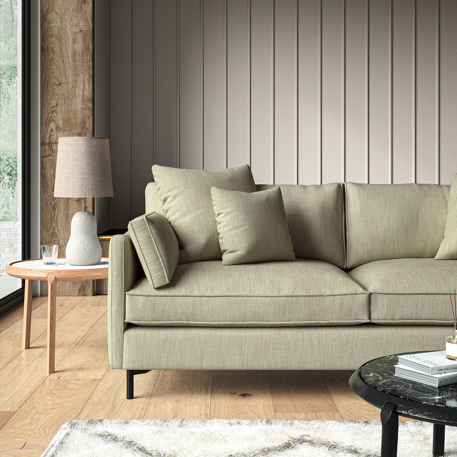 Beige sofa upholstered in a versatile woven fabric.