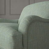 Blue chair upholstered in a versatile woven fabric.