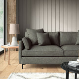 Grey sofa upholstered in a versatile woven fabric.