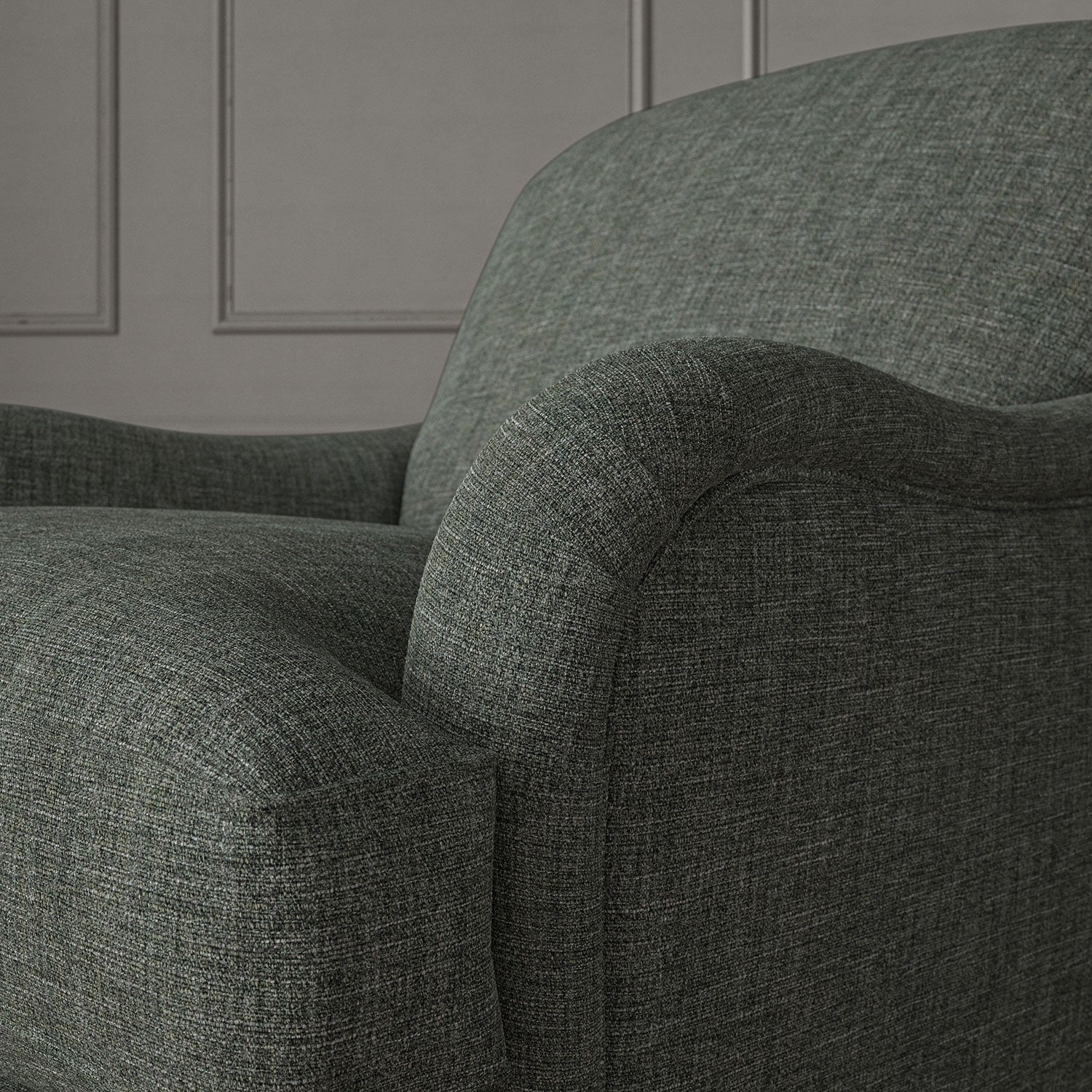 Grey chair upholstered in a versatile woven fabric.