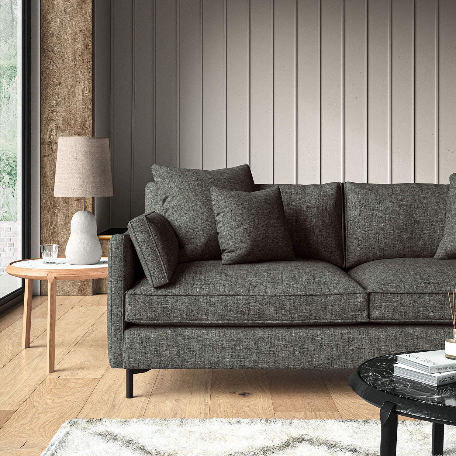 Grey sofa upholstered in a versatile woven fabric.