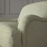 Cream chair upholstered in a versatile woven fabric.