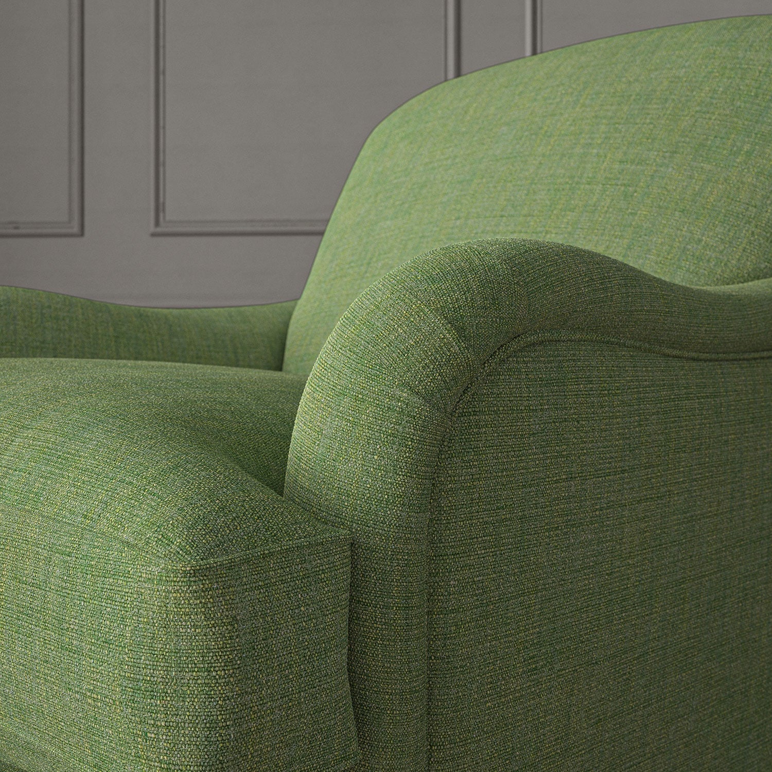 Green chair upholstered in a versatile woven fabric.